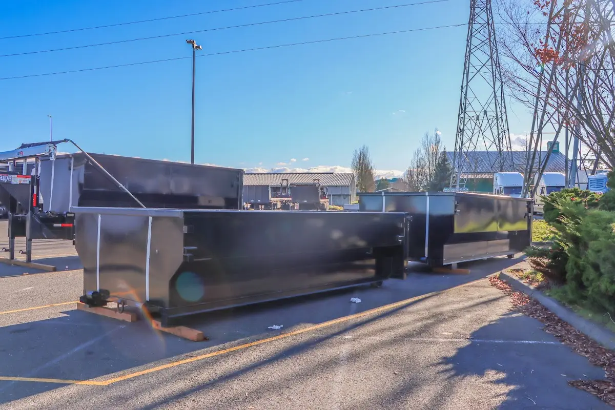 Roll-off dumpster ready for waste disposal at job site for Commercial Dumpster Rental in Framingham